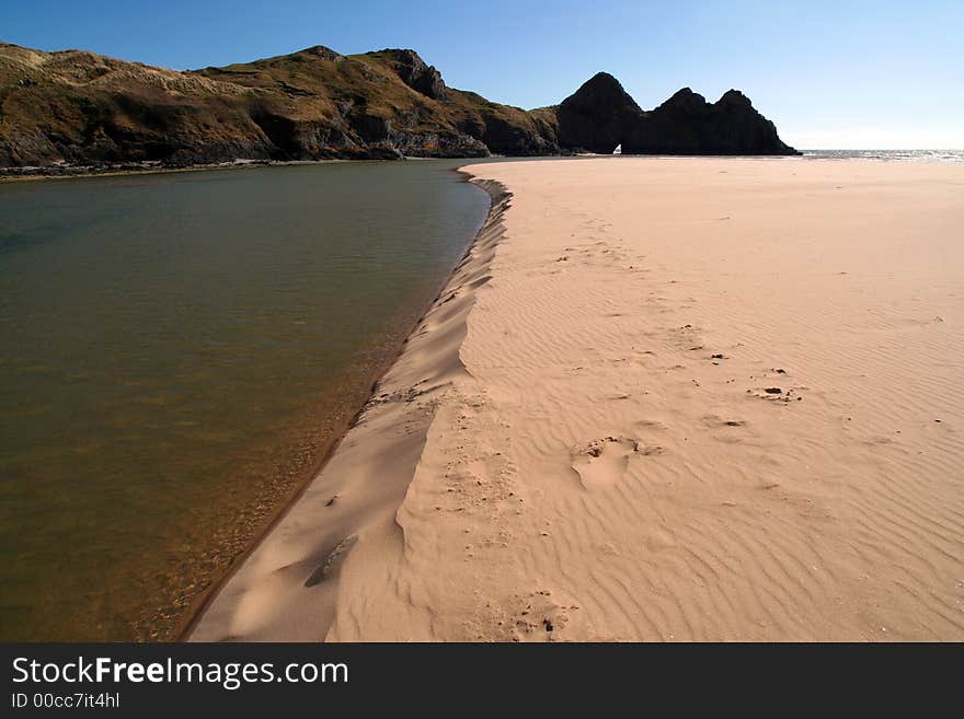 The river at three cliff bay in the gower peninsula, wales, uk