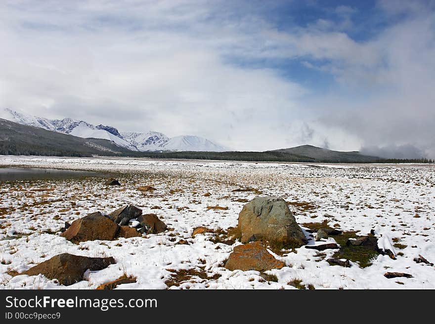 Winter lake and mountains. Altay. Russia.