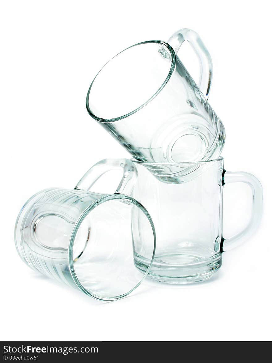 Three empty glass mugs, Isolated (look similar images in my portfolio)