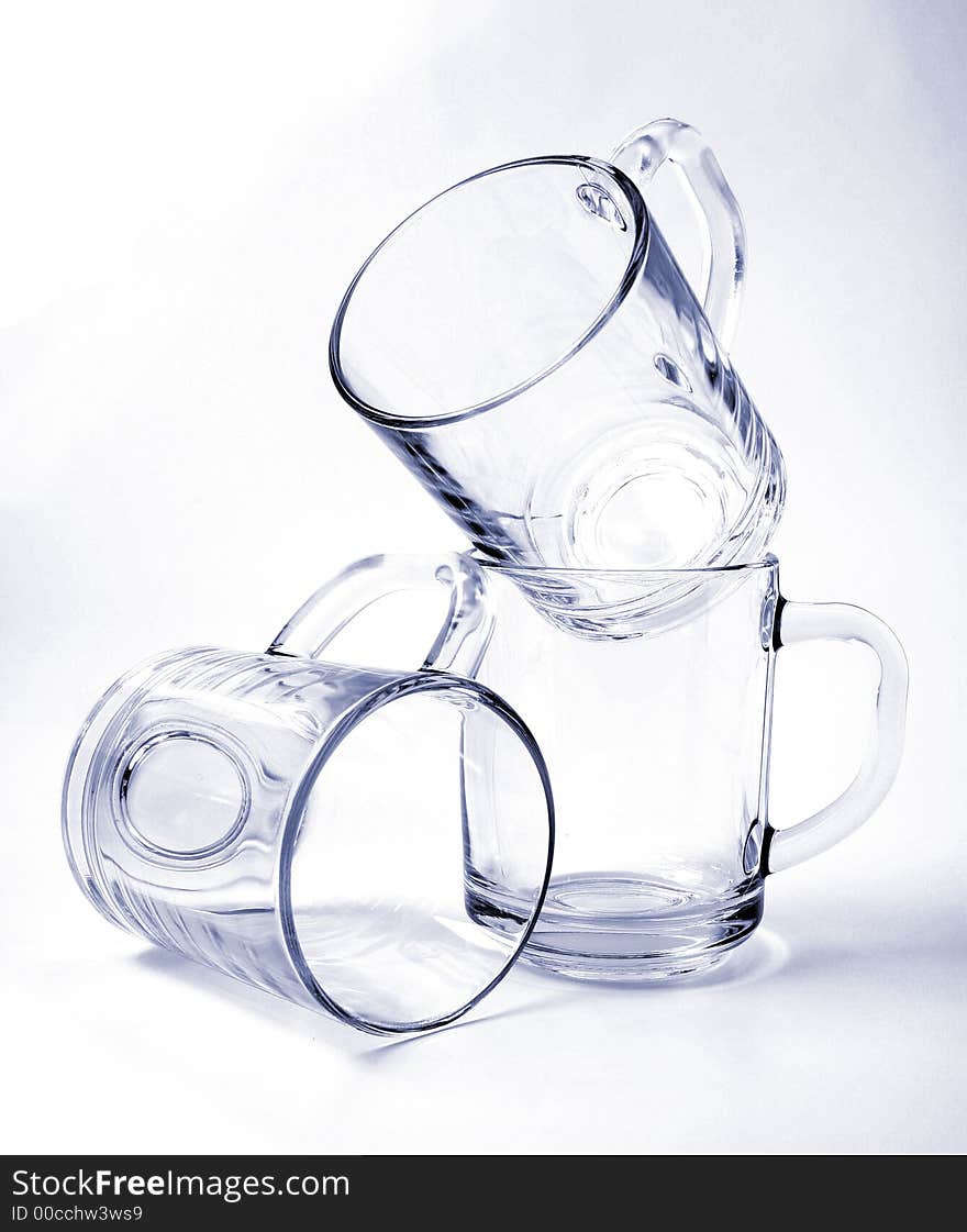 Three empty glass mugs, Isolated (look similar images in my portfolio)