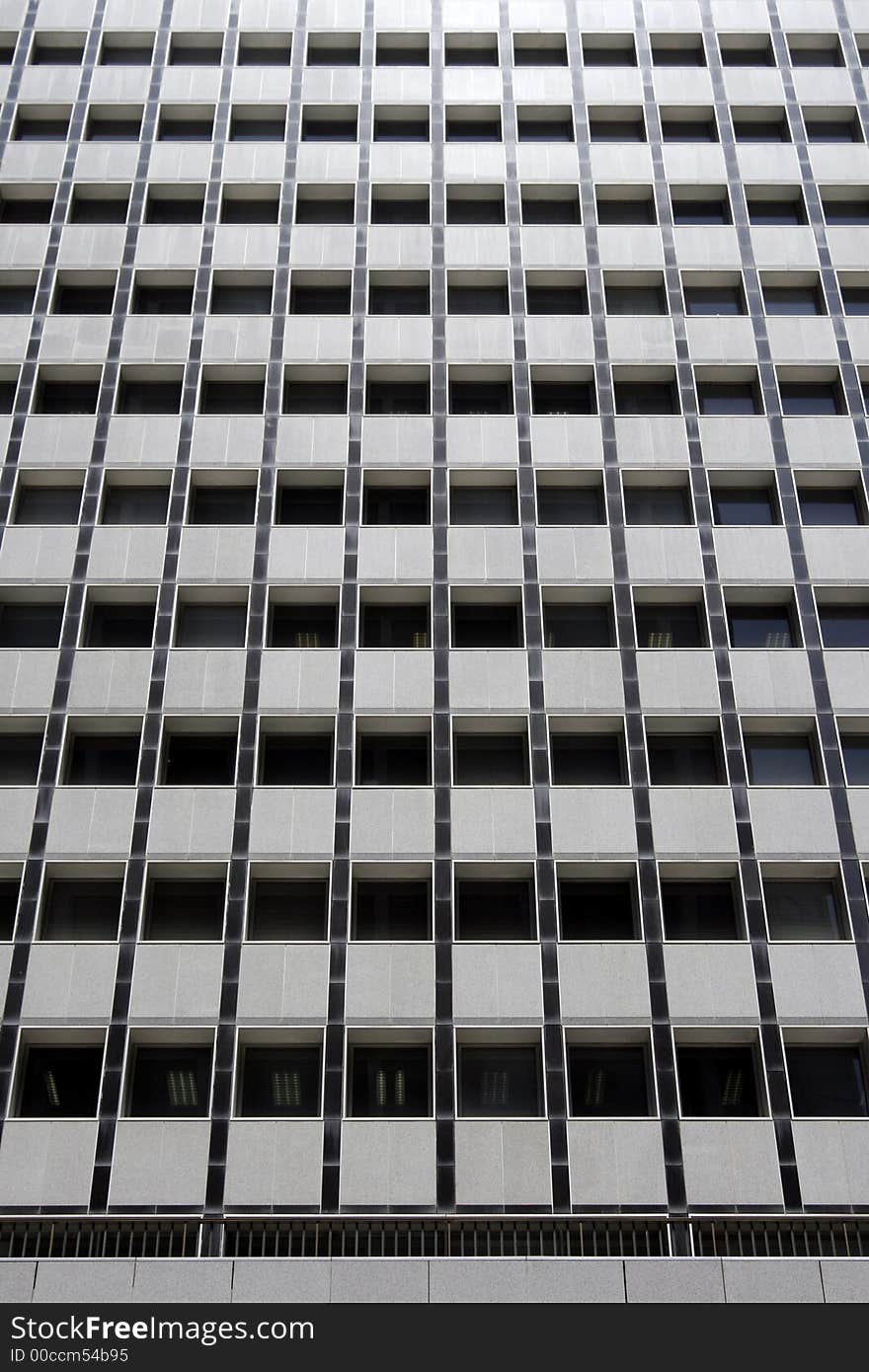 Glass Windows Of A Tall Modern Urban Office Building, Facade