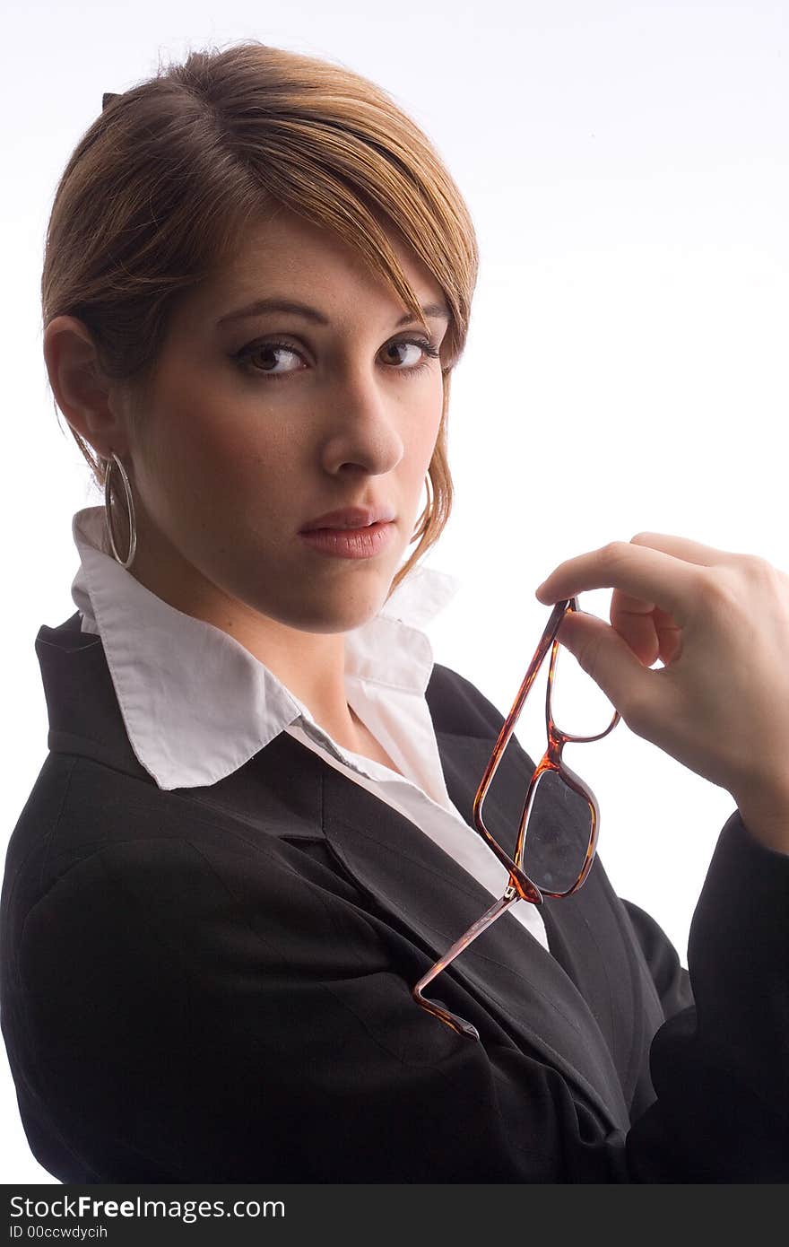 Businesswoman is holding a pair of glasses. Businesswoman is holding a pair of glasses