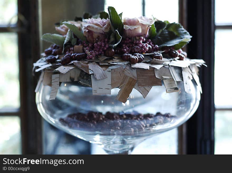 A decoration of fall elements in a glass. A decoration of fall elements in a glass