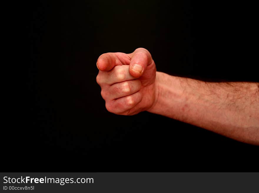 Hand on a black background