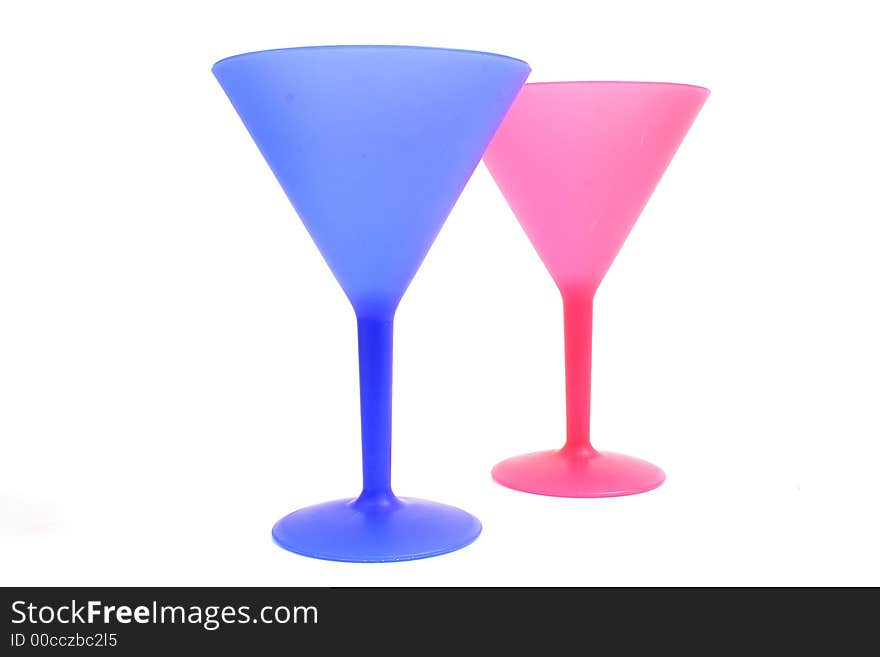 Shot of colorful cocktail glasses on white