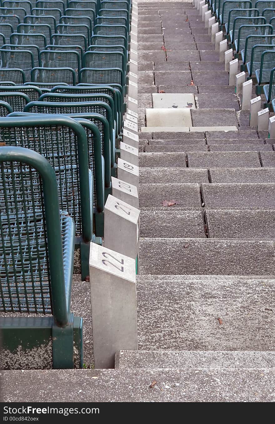 A row of seats at an open theatre