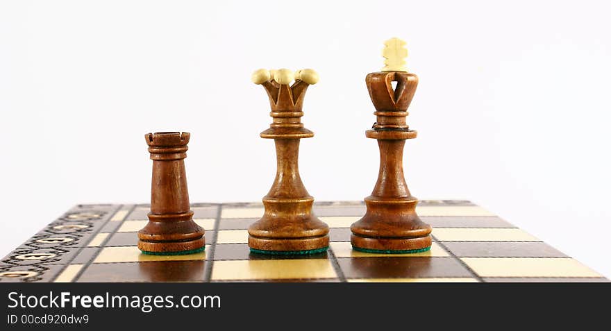 Chess board isolated on white with queen and king