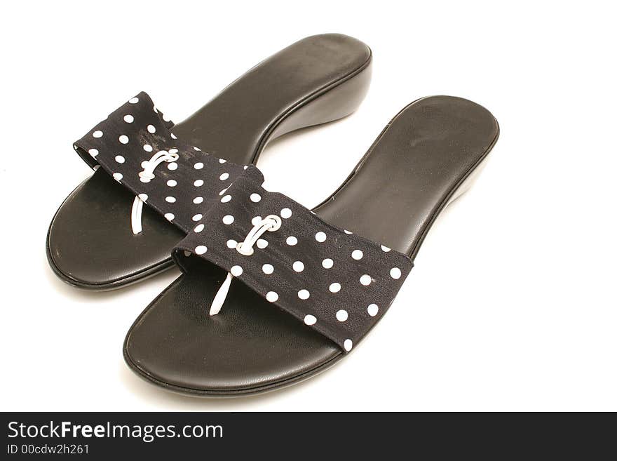 Polka dot shoes on white