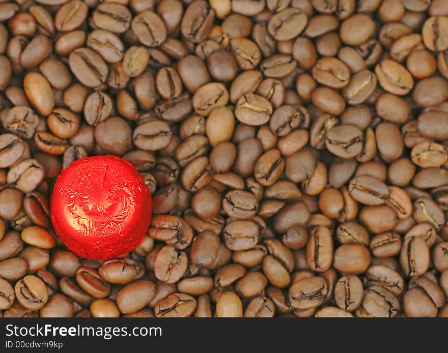 Red chocolate on coffee