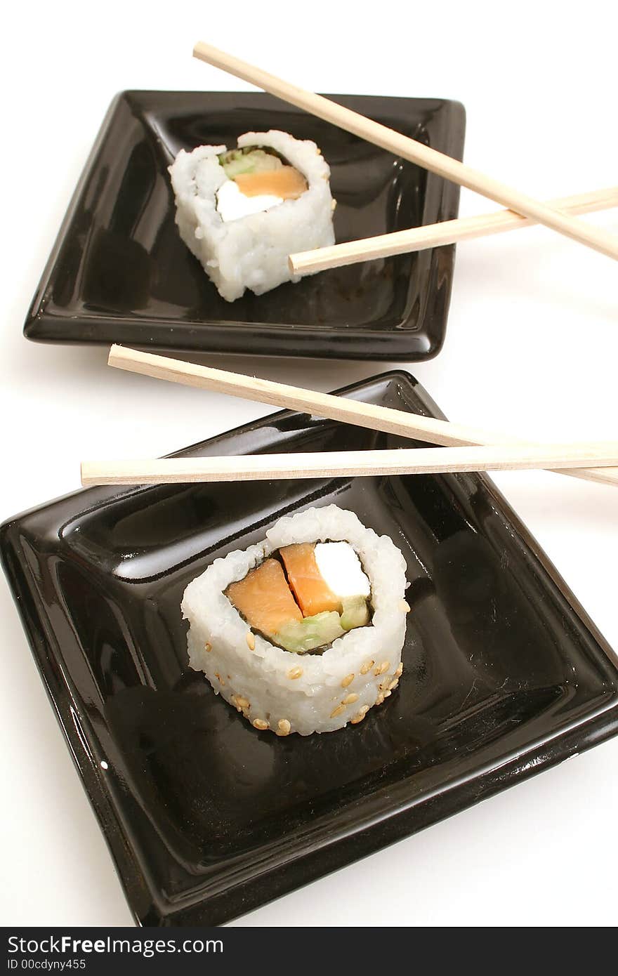 Shot of smoked salmon sushi vertical on top