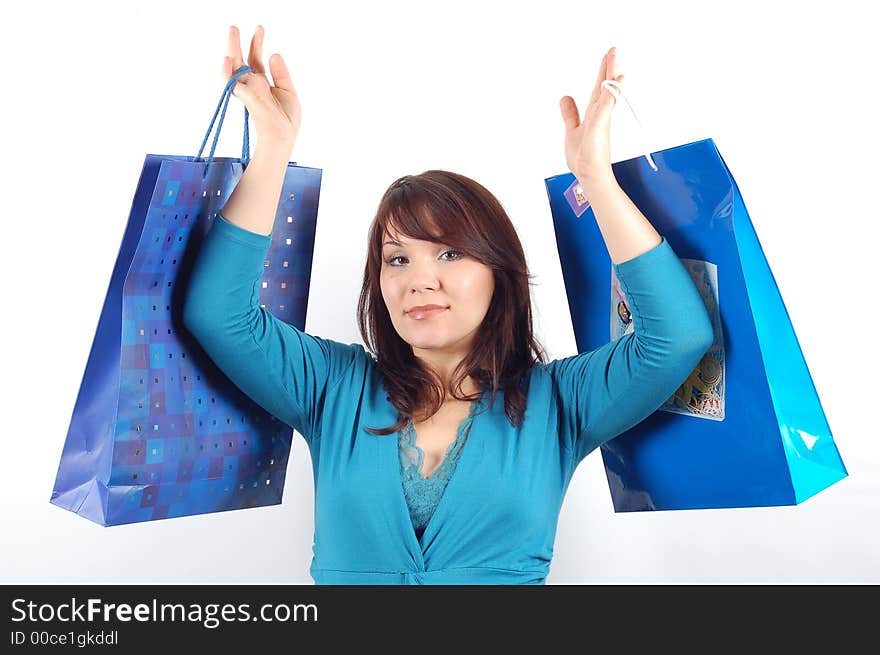 Attractive woman with shopping bags on white background. Attractive woman with shopping bags on white background