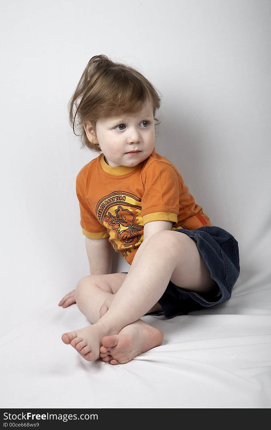 Sitting baby on white background. Sitting baby on white background