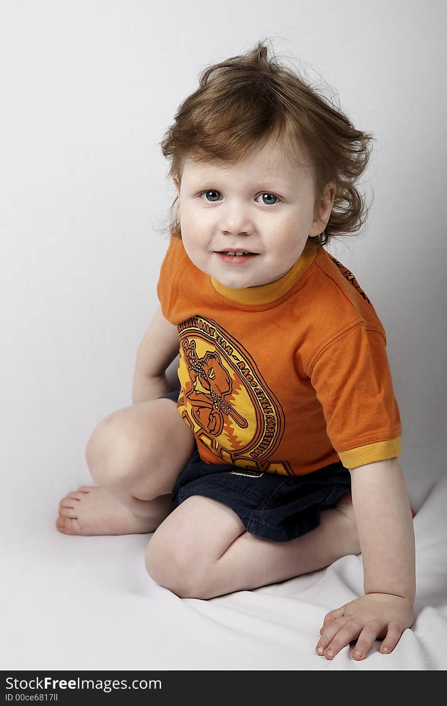 Sitting baby on white background. Sitting baby on white background