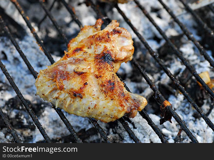 Chicken wing on barbecu grill. Chicken wing on barbecu grill