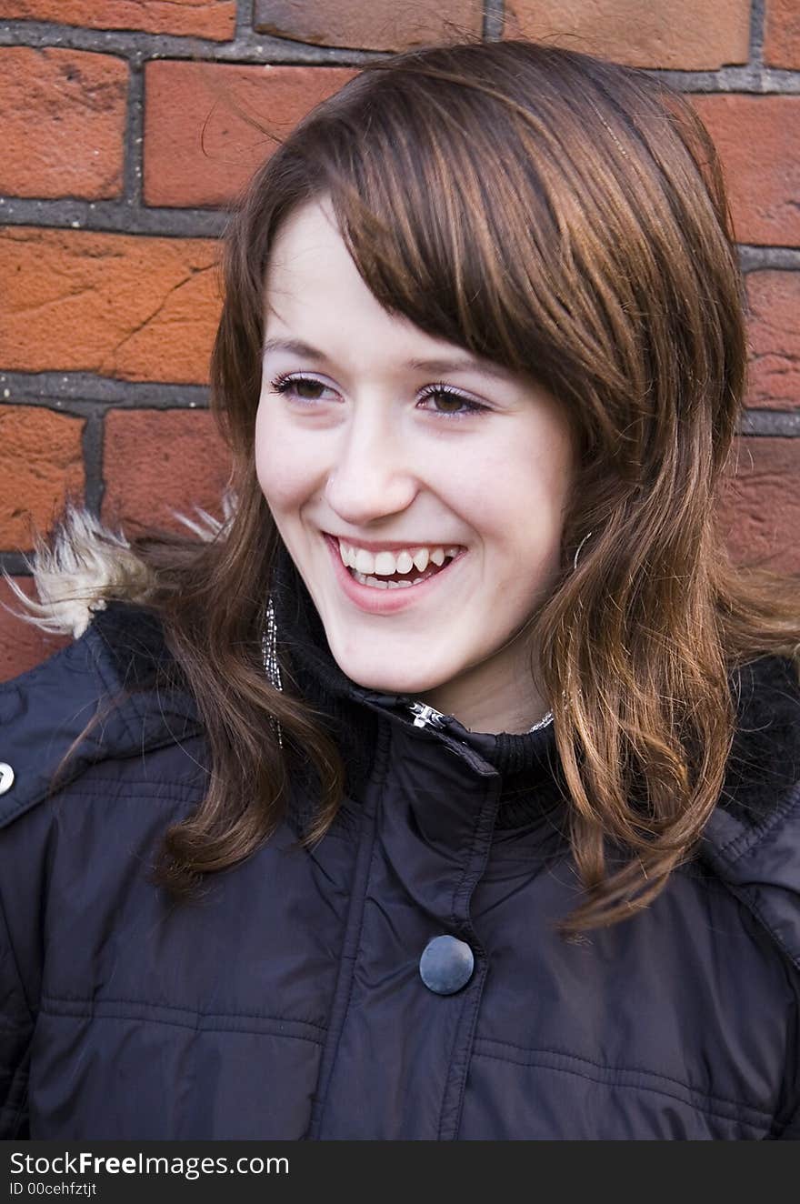 Young beautiful teenage girl smiling