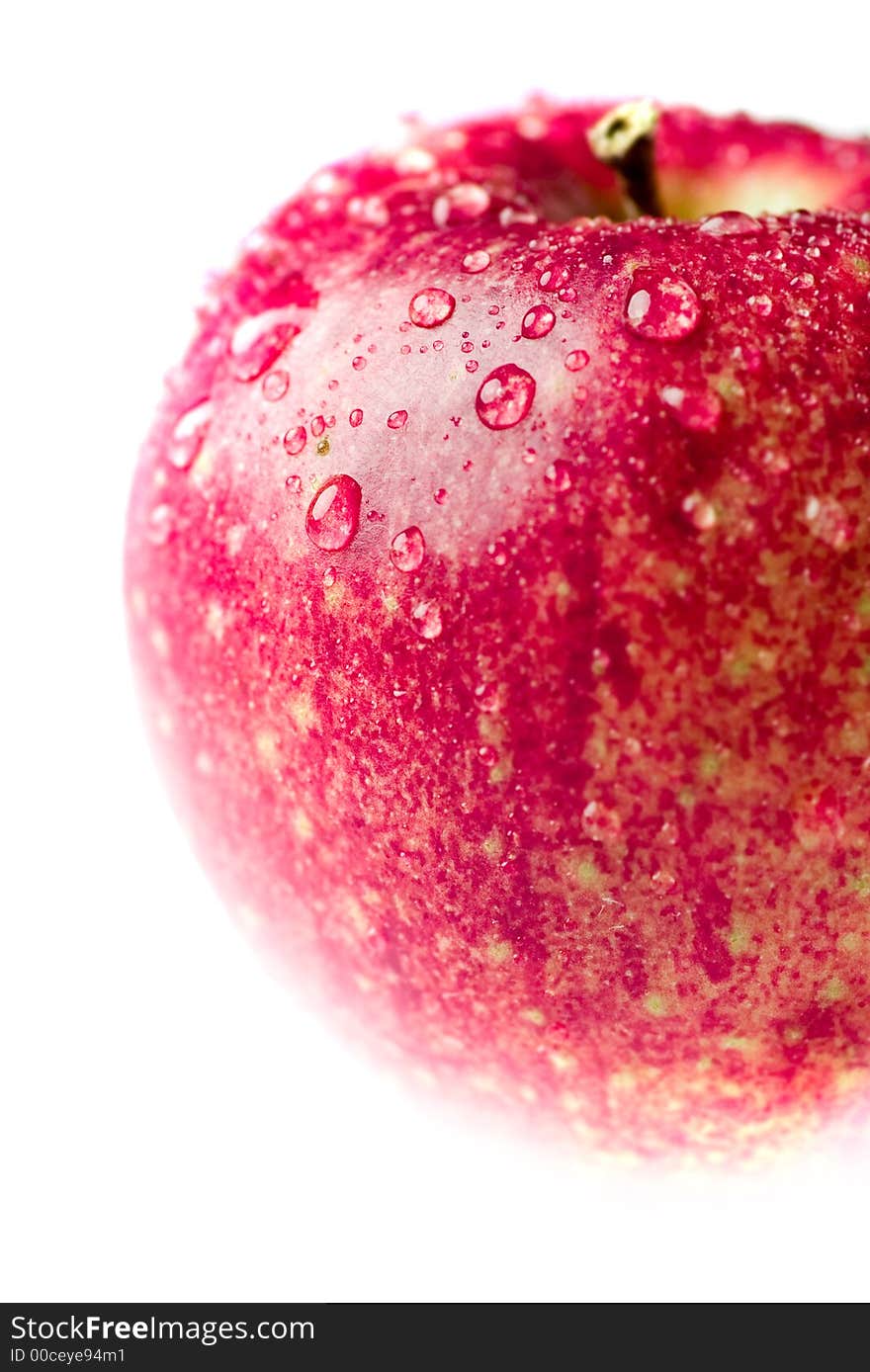 Isolated red apple with waterdrops