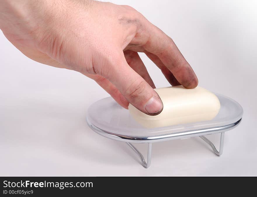 Male filthy hand with bar of soap and soap dish. Male filthy hand with bar of soap and soap dish