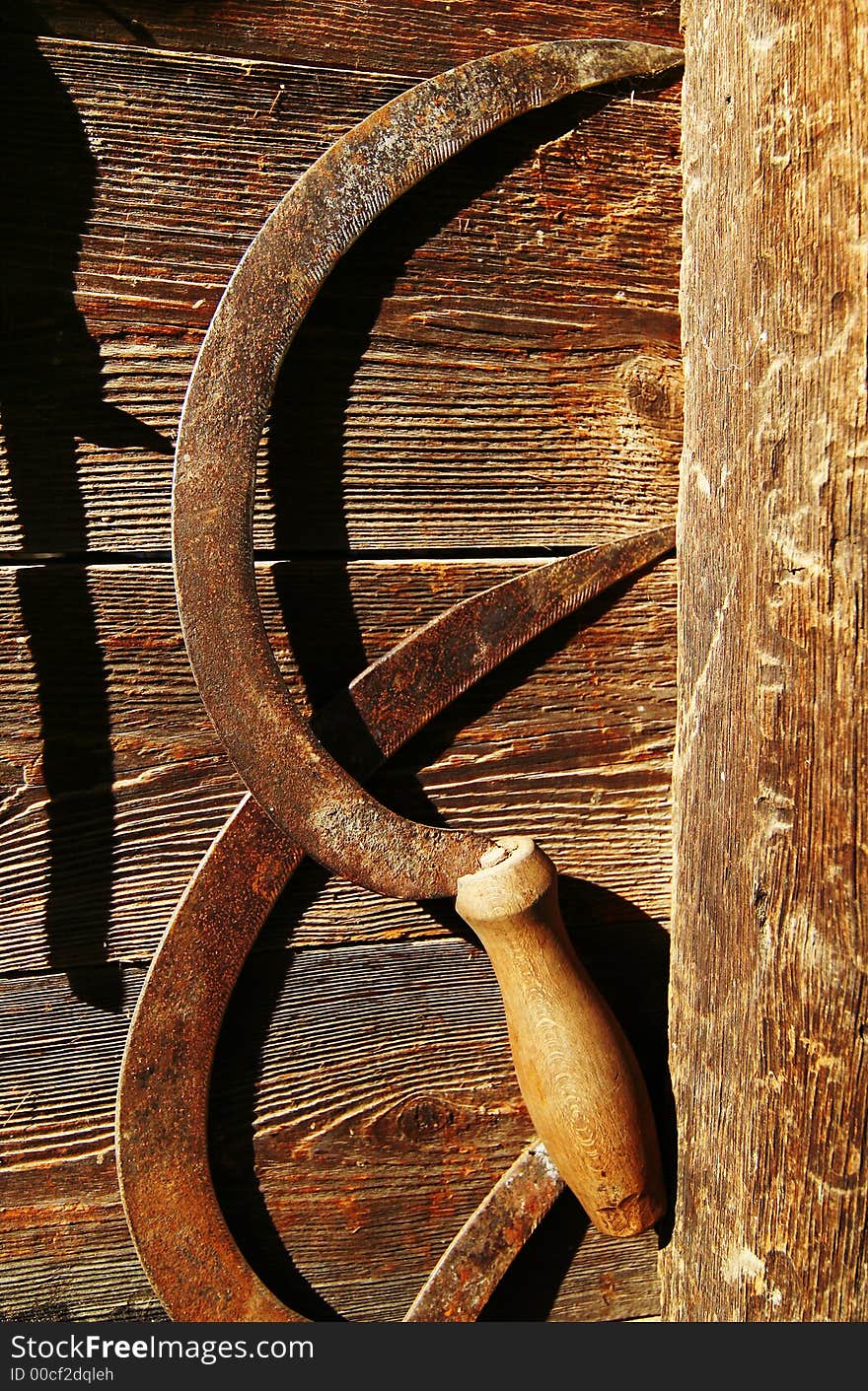 Agricultural tool on the grenary's wall. Agricultural tool on the grenary's wall