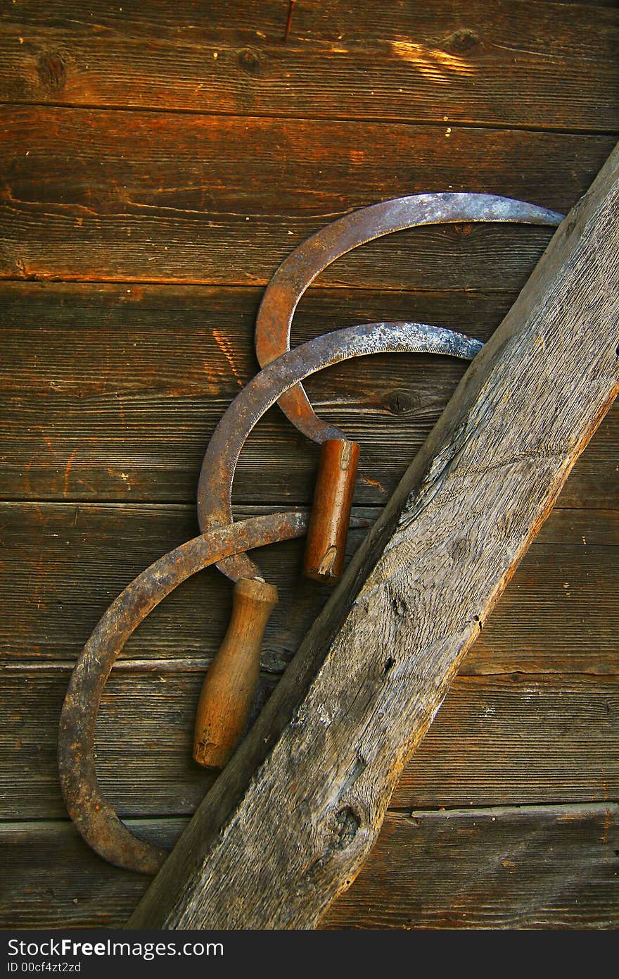 Agricultural tool on the grenary's wall. Agricultural tool on the grenary's wall