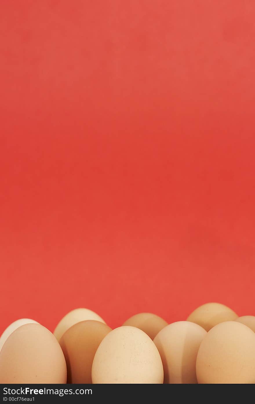 Brown eggs on red background. Brown eggs on red background