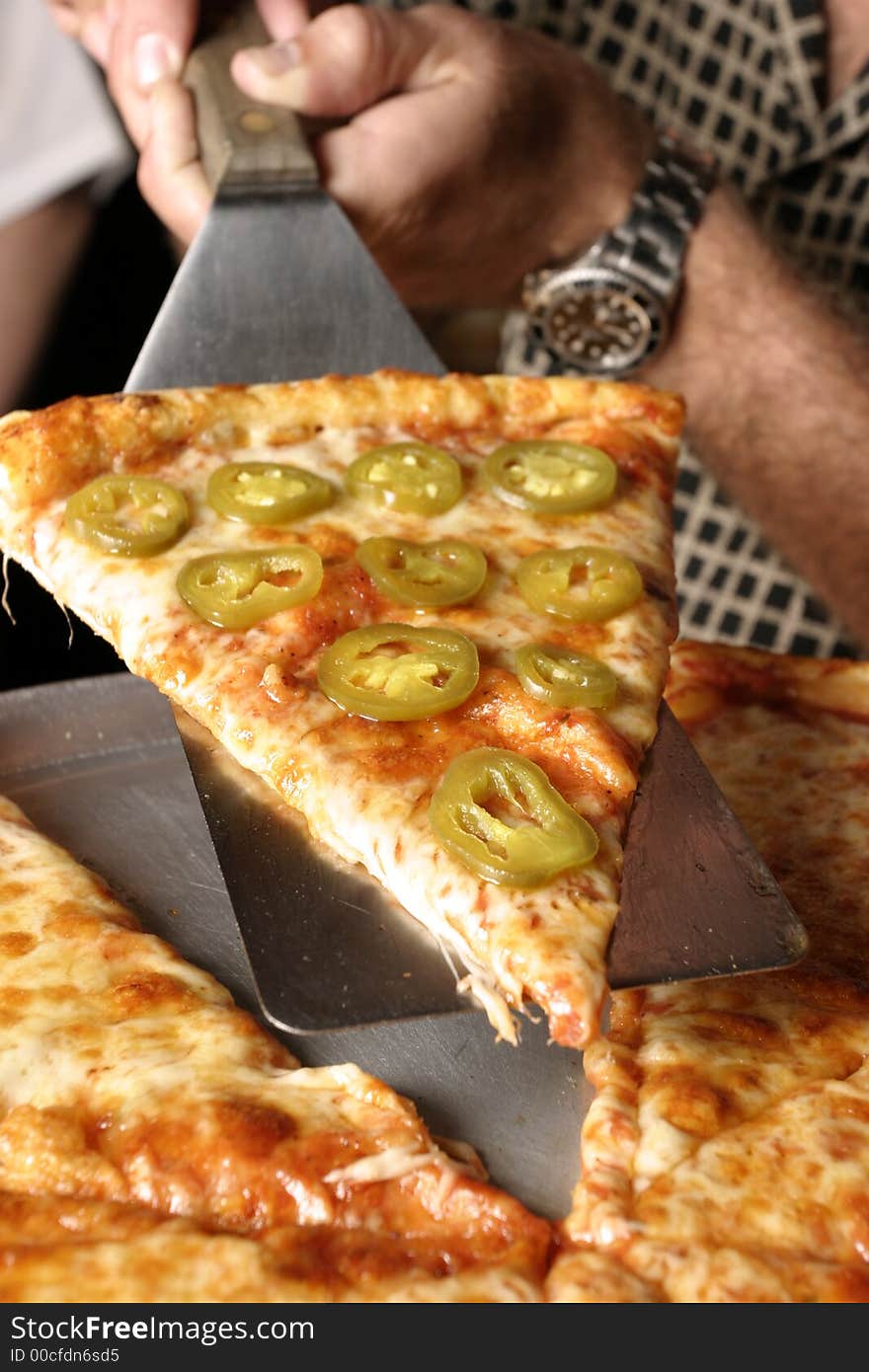 Closeup of a Pepper Pizza slice at an Angle, Closeup. Closeup of a Pepper Pizza slice at an Angle, Closeup