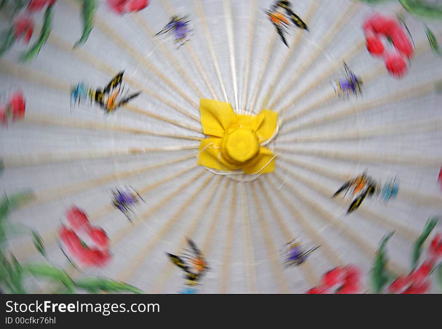 Colorful chinese umbrella in motion