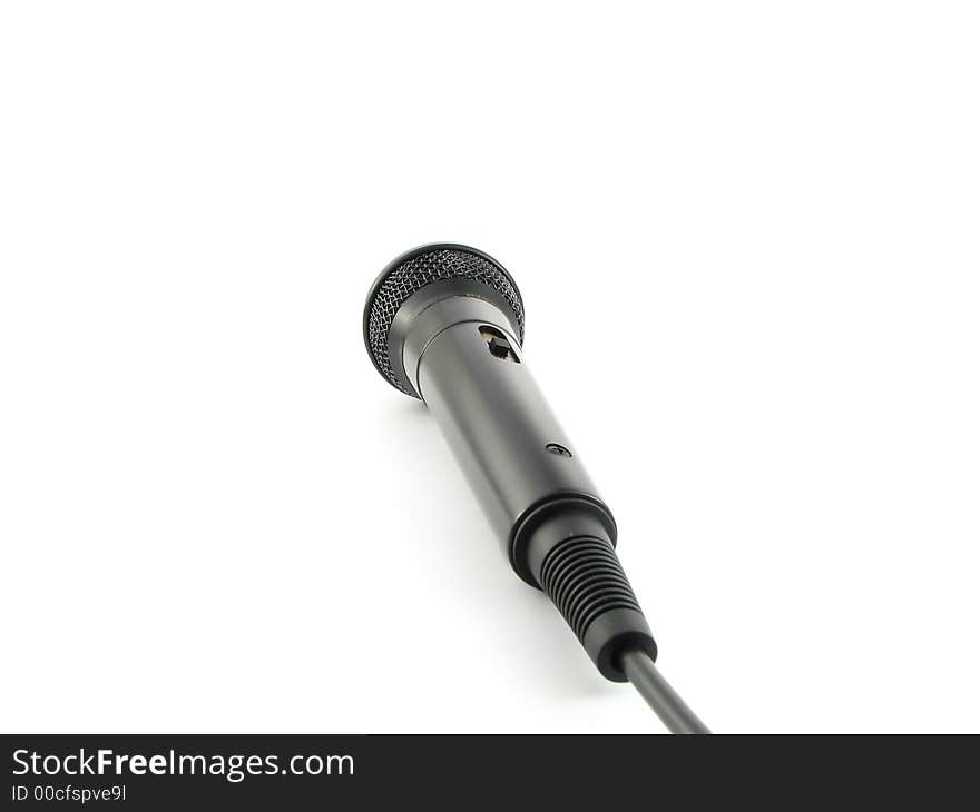 A black microphone isolated on a white background