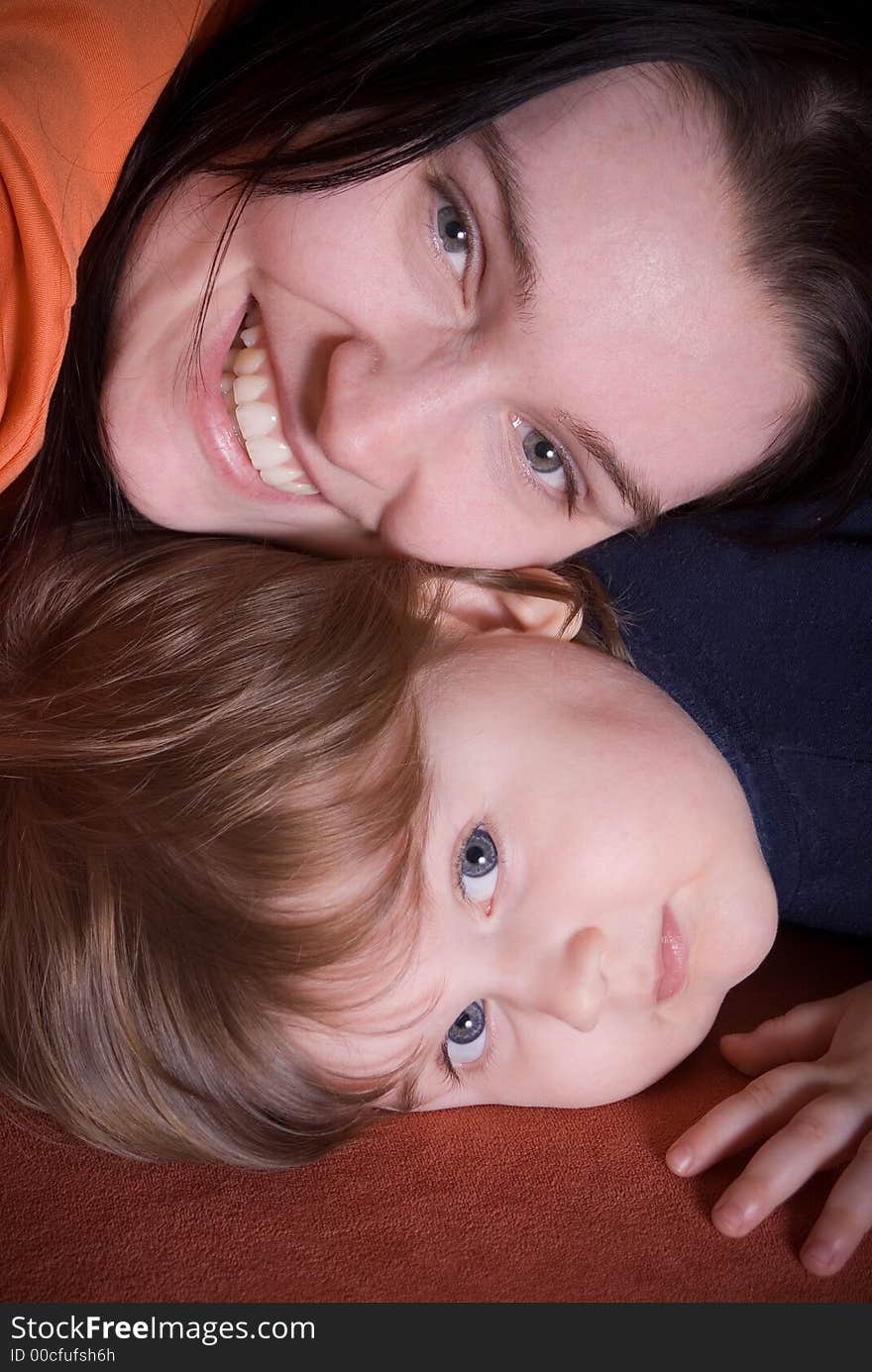 Happy mother and daughter smiling. Happy mother and daughter smiling