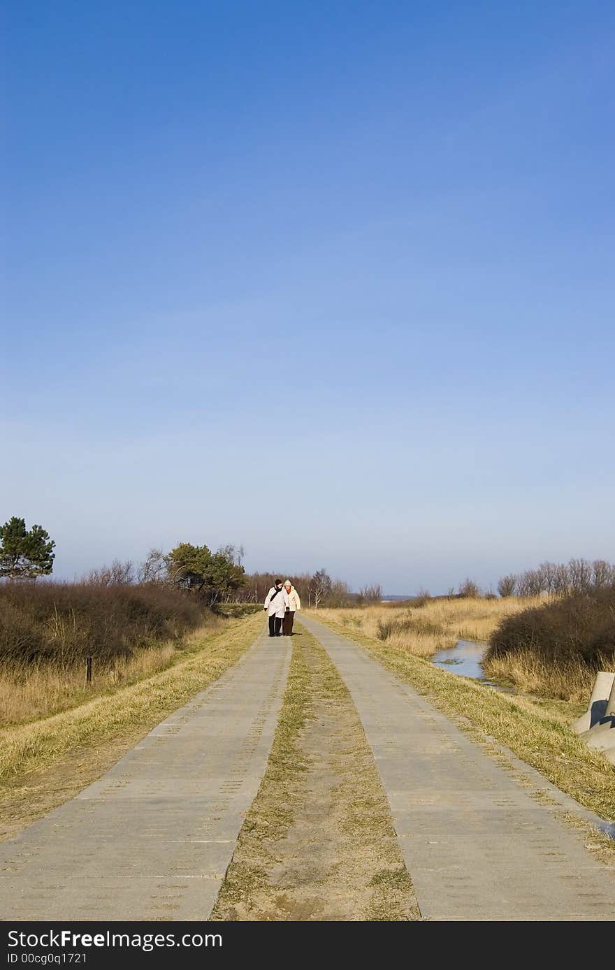 Two women walking in the distance along a concrete slabs road at the sea. Clear blue sky, copy space.

<a href='http://www.dreamstime.com/baltic-sea-scenics.-seaside-towns-and-villages-as-well.-rcollection3976-resi208938' STYLE='font-size:13px; text-decoration: blink; color:#FF0000'><b>MORE BALTIC PHOTOS »</b></a>. Two women walking in the distance along a concrete slabs road at the sea. Clear blue sky, copy space.

<a href='http://www.dreamstime.com/baltic-sea-scenics.-seaside-towns-and-villages-as-well.-rcollection3976-resi208938' STYLE='font-size:13px; text-decoration: blink; color:#FF0000'><b>MORE BALTIC PHOTOS »</b></a>