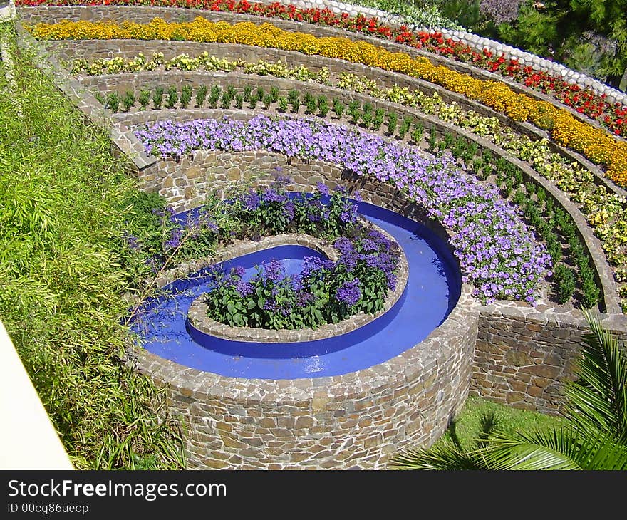 Walled flower bed built into hillside garden.south facing or improved sunlight. Walled flower bed built into hillside garden.south facing or improved sunlight.