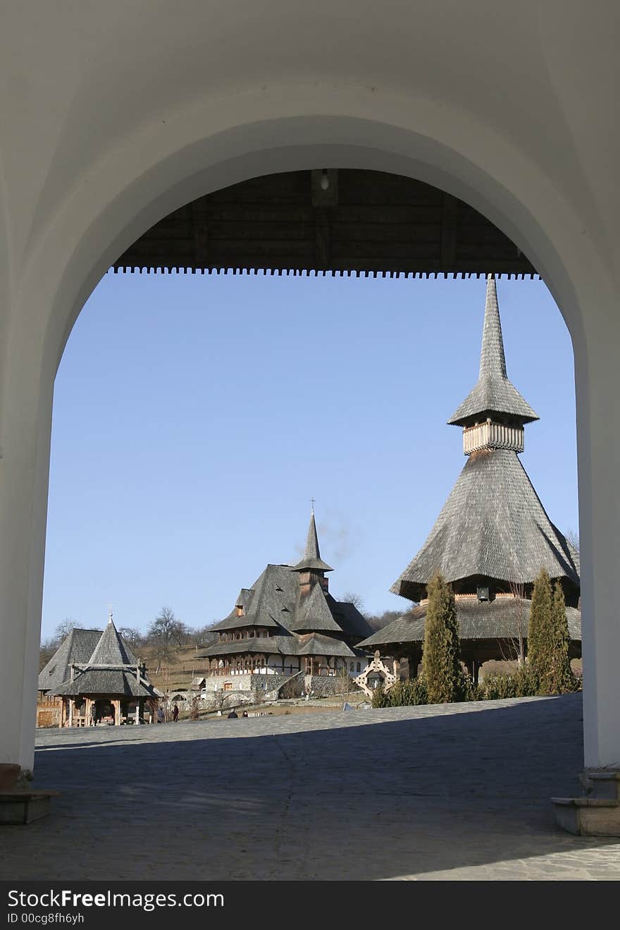 The entrance in the wooden monastery framed picture