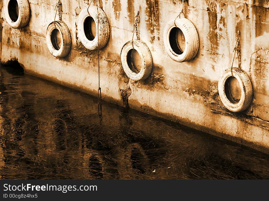 Some old tires in a dock