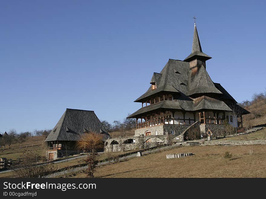 Wooden buildings on a ortodox monastery and the monastery park. Wooden buildings on a ortodox monastery and the monastery park