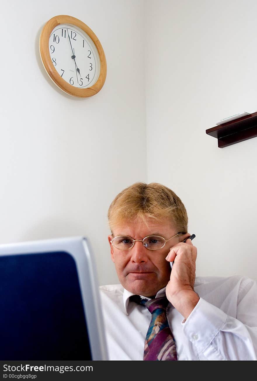 A businessman attending to an important call.