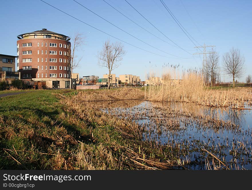 Suburb and power lines encroaching upon nature. Suburb and power lines encroaching upon nature