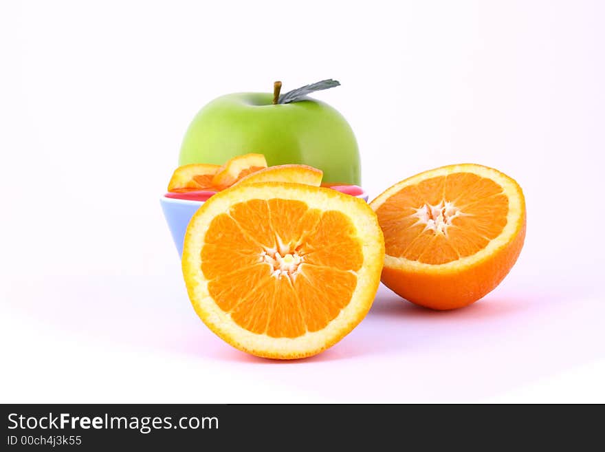 Orange Jelly in a white bowl with silverware. Orange Jelly in a white bowl with silverware.