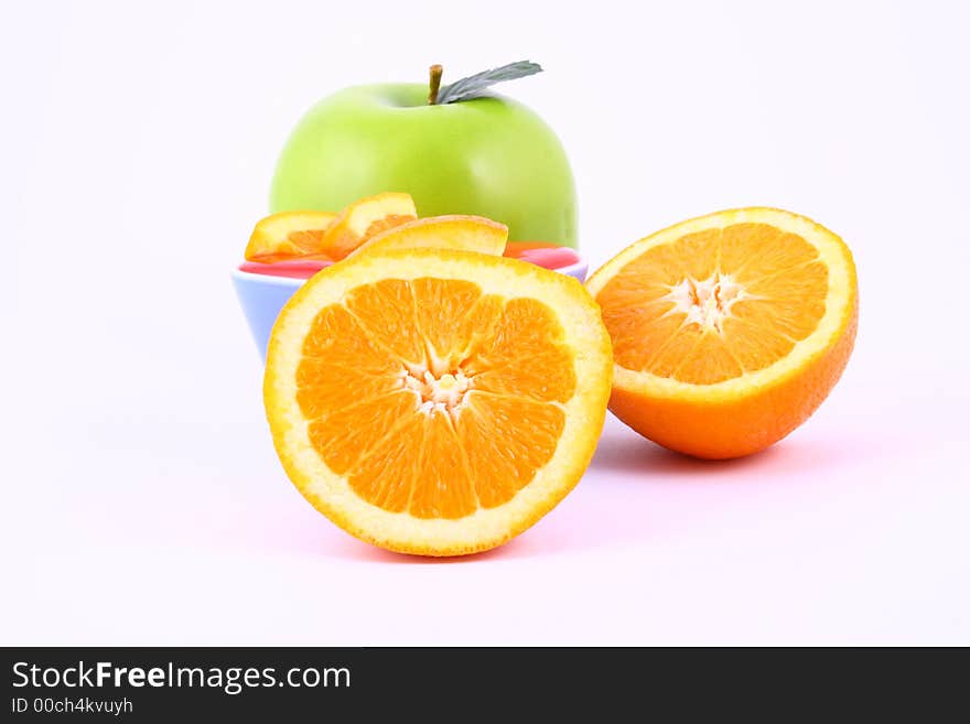 Orange Jelly in a white bowl with silverware. Orange Jelly in a white bowl with silverware.