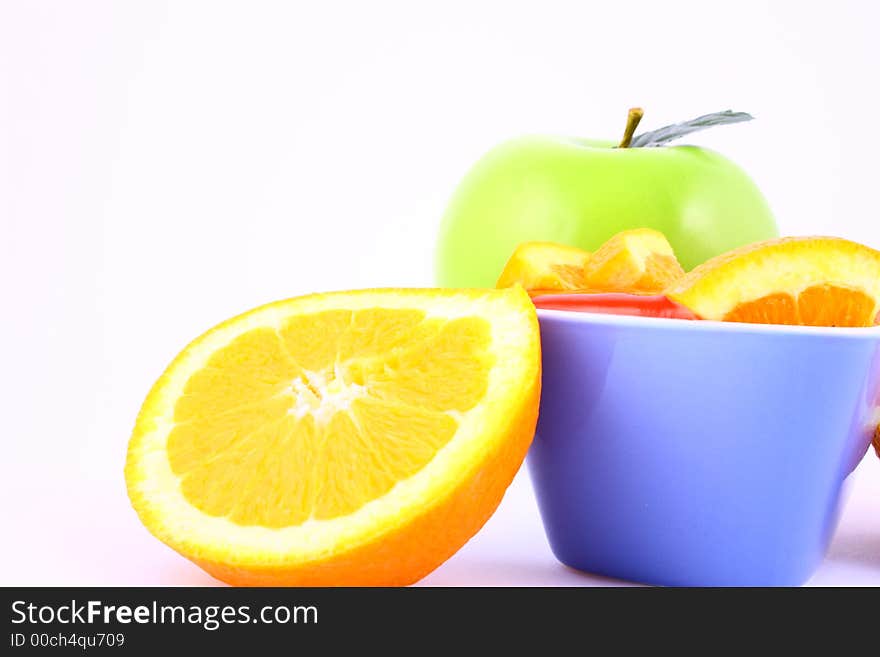 Orange Jelly in a white bowl with silverware. Orange Jelly in a white bowl with silverware.