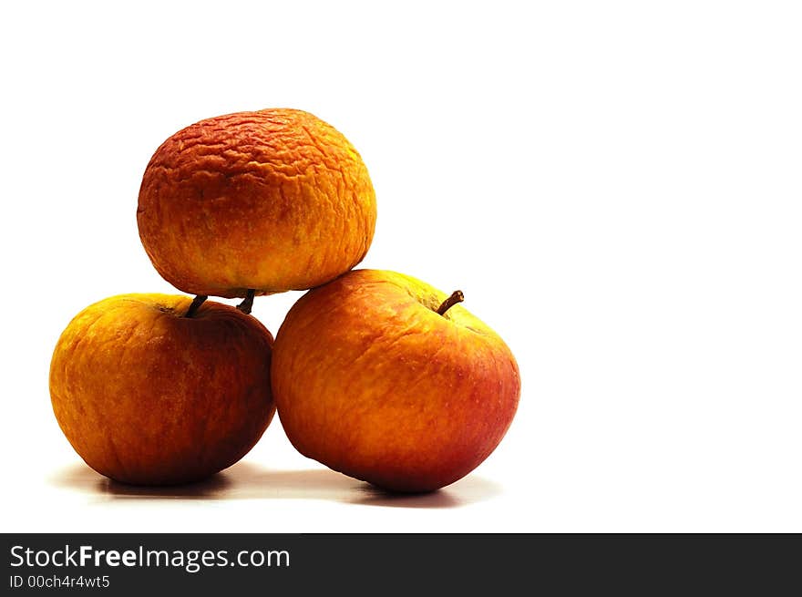 A trio of old apples. A trio of old apples