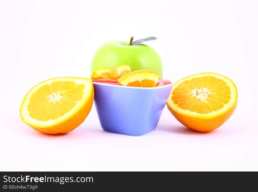 Orange Jelly in a white bowl with silverware. Orange Jelly in a white bowl with silverware.