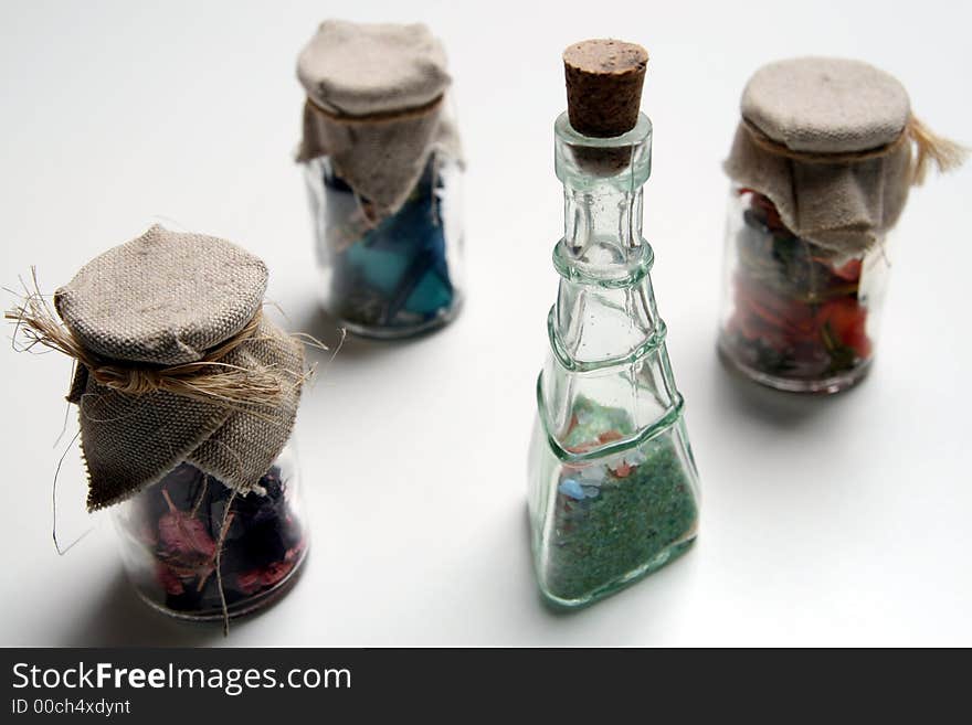 Some colour dried flowers in small glass doses. Some colour dried flowers in small glass doses.