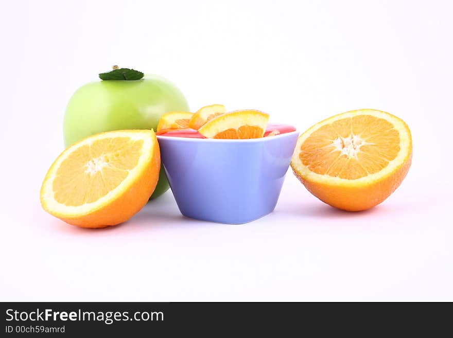 Orange Jelly in a white bowl with silverware. Orange Jelly in a white bowl with silverware.