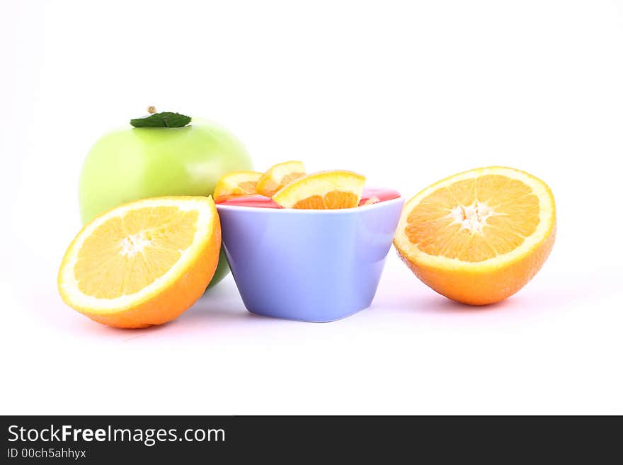 Orange Jelly in a white bowl with silverware. Orange Jelly in a white bowl with silverware.