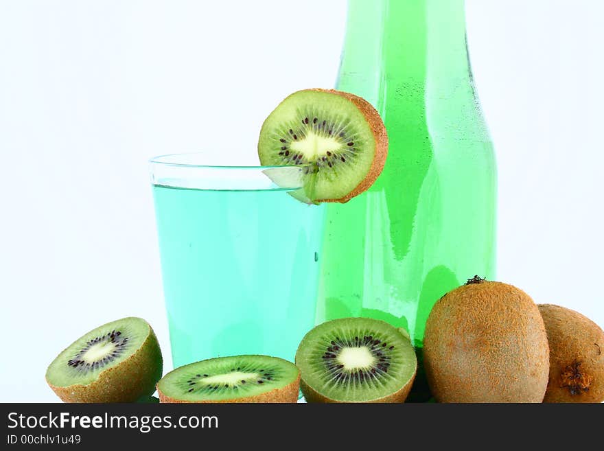 Glass of kiwi smoothie close-ups. Glass of kiwi smoothie close-ups