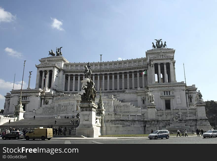 Tourists in front  of Victor Emmanuel II monument. also called Altare della Patria, fatherland's altar, a mausoleum, a tomb of an unknown soldier. Rome, Italy. Tourists in front  of Victor Emmanuel II monument. also called Altare della Patria, fatherland's altar, a mausoleum, a tomb of an unknown soldier. Rome, Italy