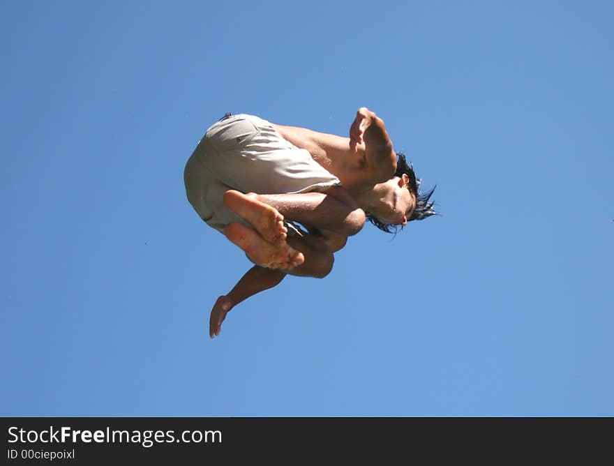 Boy jumping to the pool. Boy jumping to the pool