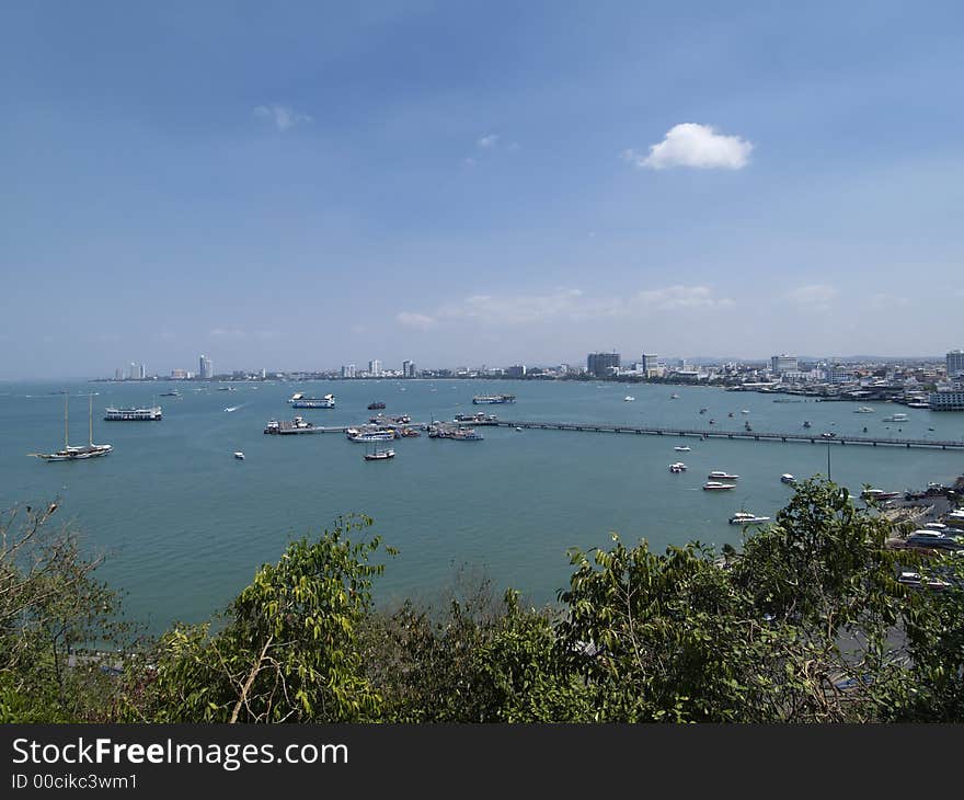 Pattaya City, the resort town in Chonburi province, Thailand, with the bay in the foreground. Pattaya City, the resort town in Chonburi province, Thailand, with the bay in the foreground