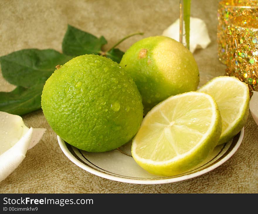 Green Limes On A Plate