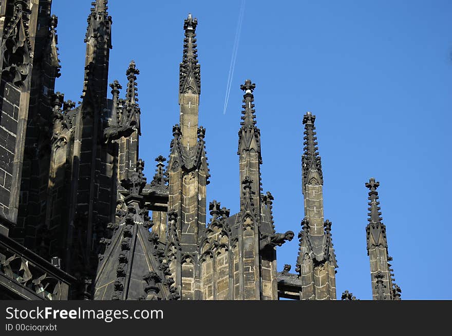 St. Vitus cathedral details with flying plane.Prague, Czech Republic