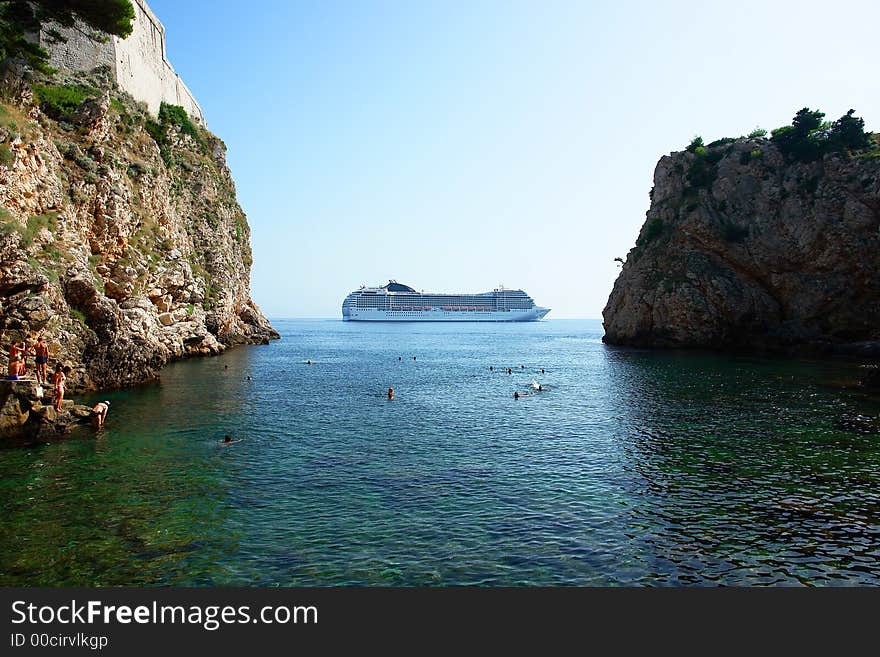 Sea bay, swimming area, a big ferry